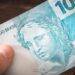 nota de dinheiro brasileira na mao reais moeda 174465395 800x500 740x414